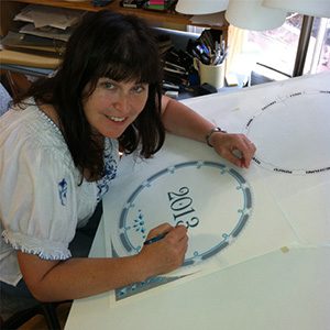 Mickie Caspi creating the Jewish Art Calendar in her studio in Newton, Massachusetts